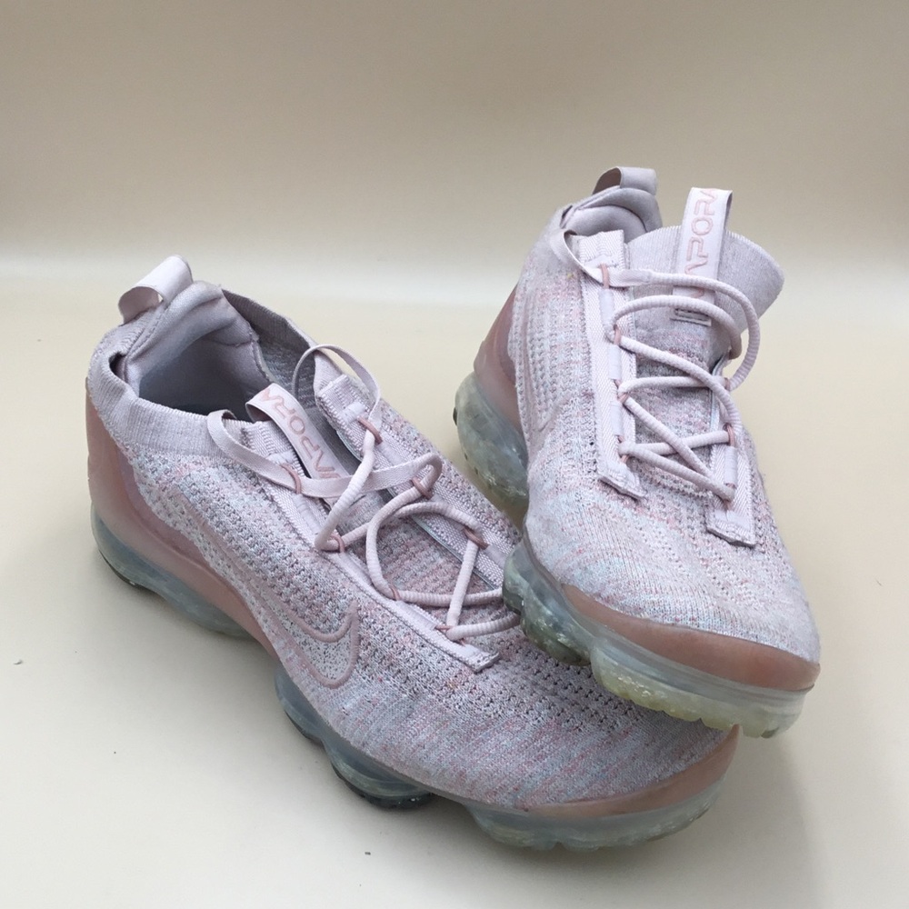Women’s Light Pink Nike VaporMax Athletic Sneakers.